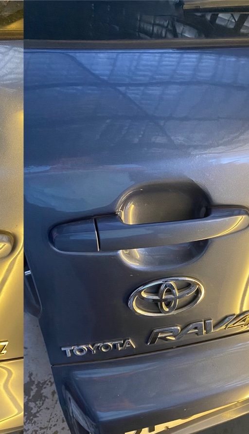 Toyota RAV4 door dent (after paintless repair)